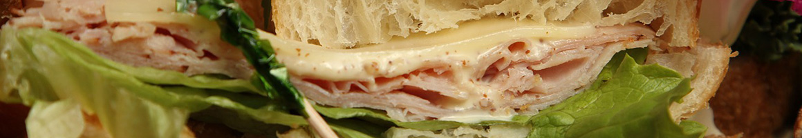 Eating American (Traditional) Deli Sandwich at Dakota Cafe restaurant in Ellensburg, WA.